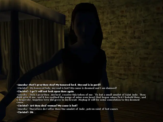 Primer plànol d'Anezka en pijama, oferint-li l'amulet de Sant Judes Tadeu a Christof.