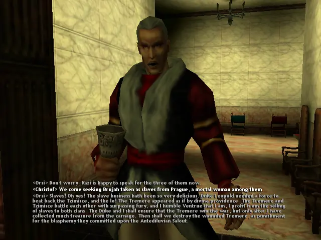 Un Vampir amb robes relativament elegants, una copa a la mà i, de fons, cadires d'un cert luxe.