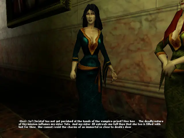 Kazi, en vestit de gala verd blavós i escoti, amb Teta (o Zil?) al costat, en un vestit molt igual, però d'un verd més natural.